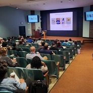 an auditorium showing participants at the 2025 LMS
