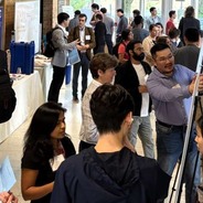 Attendees at the I-FMD materials symposium poster session